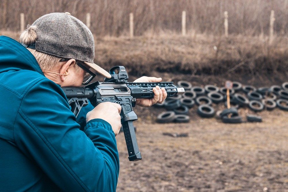 чоловік із гвинтівкою