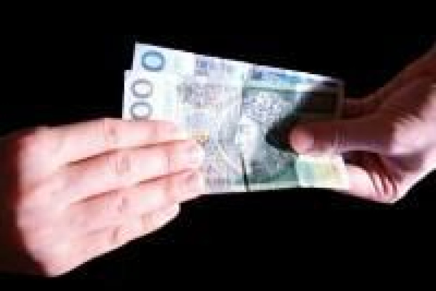 łapówka pieniadze dłoń