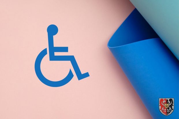 Symbol niepełnosprawności i herb Powiatu