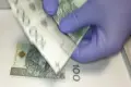 Oszuści zapłacili fałszywym banknotem i szantażowali drukarza
