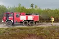 Forest fire near Wierzbowa during a downpour and storm