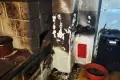 Płonąca butla w kuchni. Strażacy w porę zapobiegli tragedi