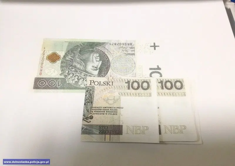 Oszuści zapłacili fałszywym banknotem i szantażowali drukarza