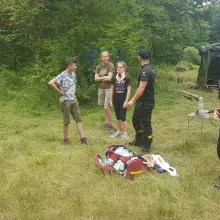 View photo: Firefighters at a scout camp