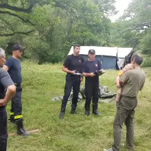 View photo: Firefighters at a scout camp