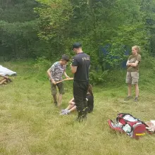 View photo: Firefighters at a scout camp