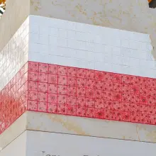 View photo: Maria Starzyk’s decoration applied to 750 ceramic tiles forming the Polish flag on a Bolesławiec monument commemorating the centenary of Poland regaining independence