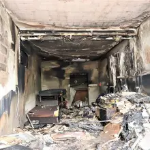 View photo: Burned garage and suspect