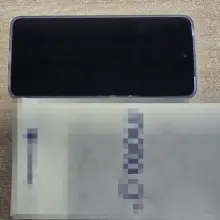 Zobacz zdjęcie: Podejrzany i telefon